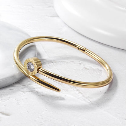Nail Crossover Bangle